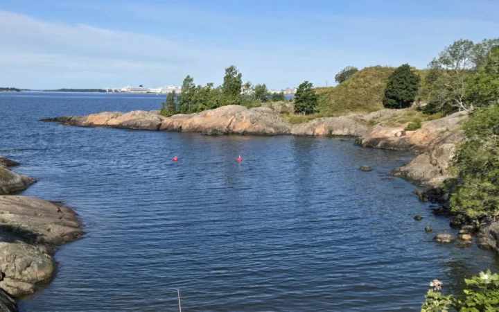 Rocky shoreline and blue water in the Helsinki archipelago