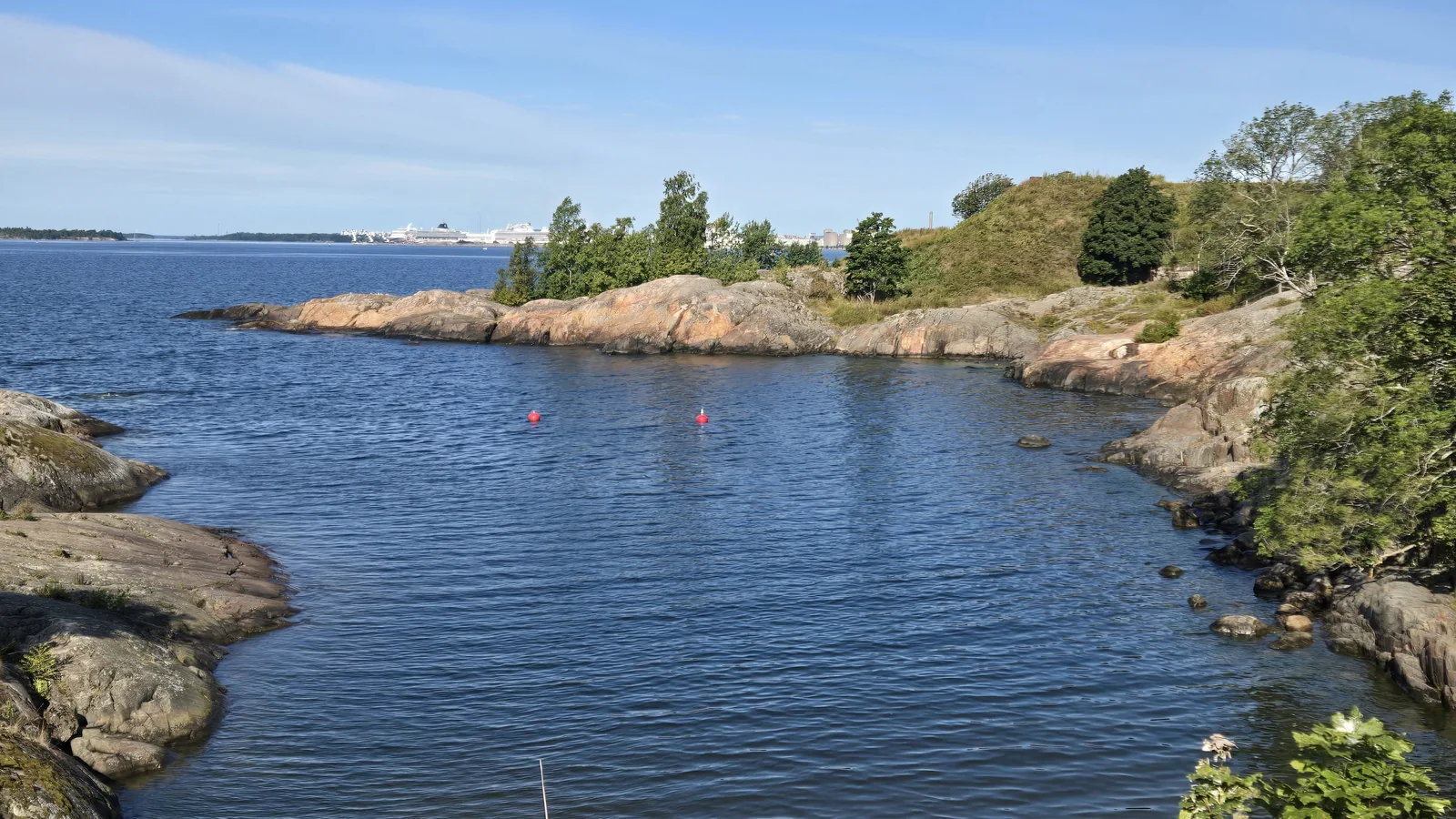 Rocky shoreline and blue water in the Helsinki archipelago